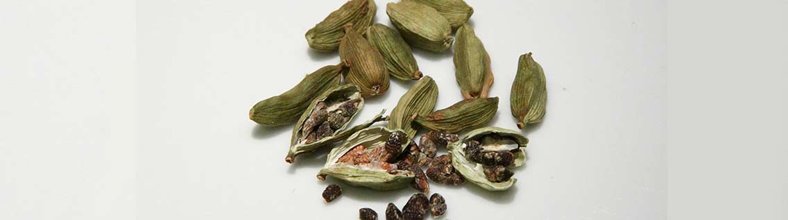 Background image of cardamom pods