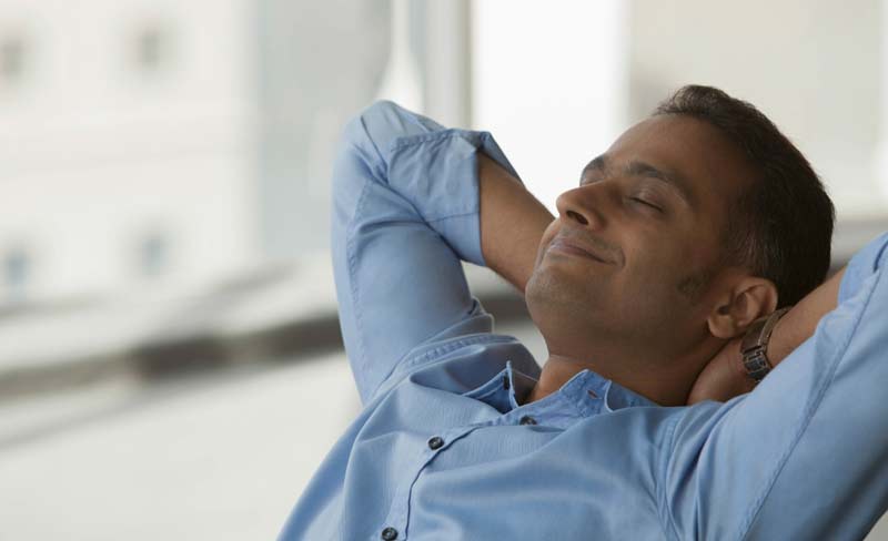 Man relaxing on chair