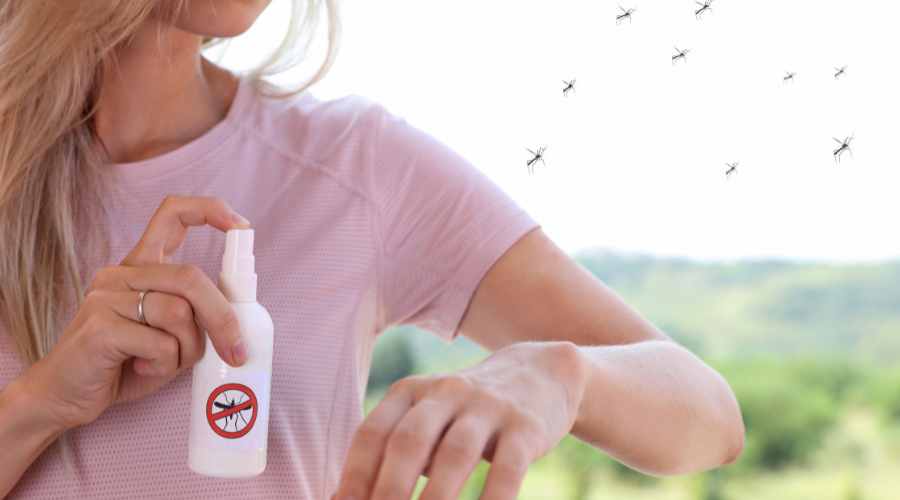 Woman using DIY mosquito repellent