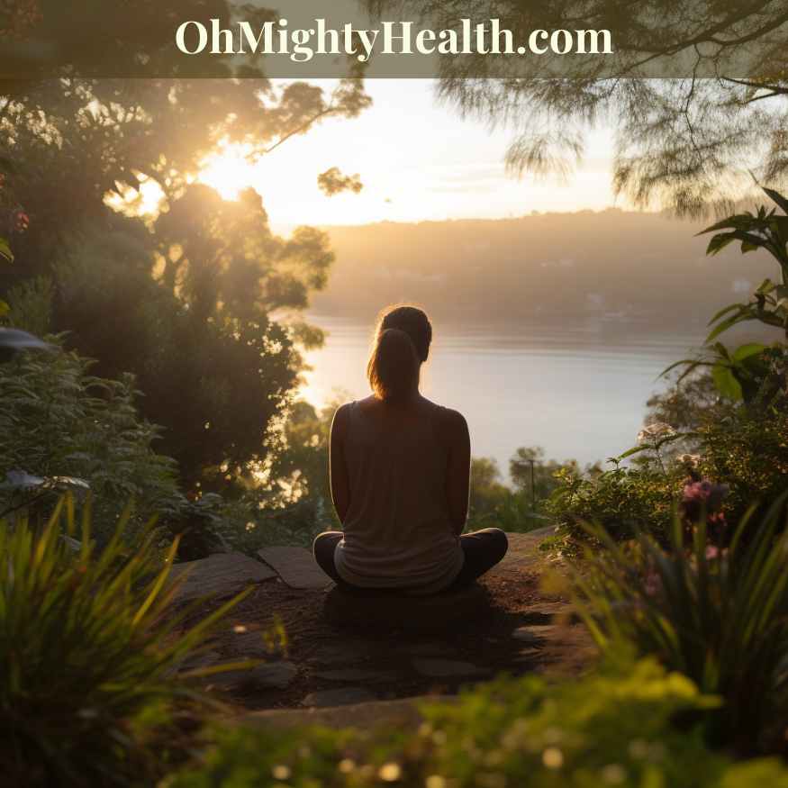 Person meditating in a peaceful outdoor setting during a tranquil sunrise.