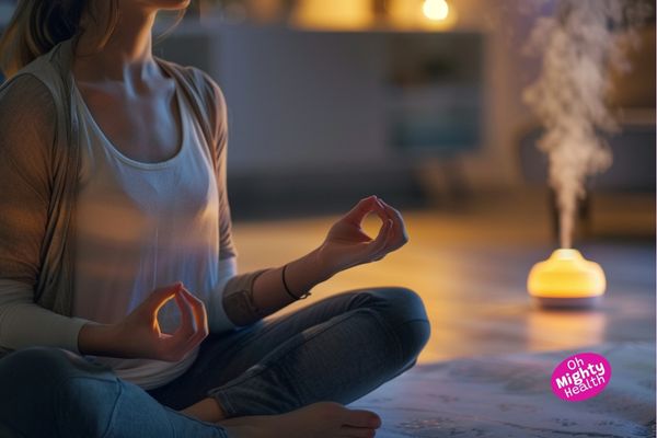 Meditating with a diffuser.